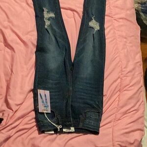 These are skinny high waisted jeans.